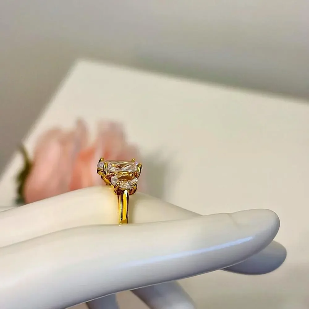 18k gold plated ring with 3 prong CZ diamonds
